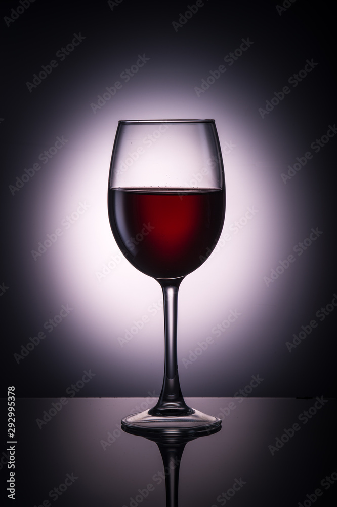  glass of red wine on the background