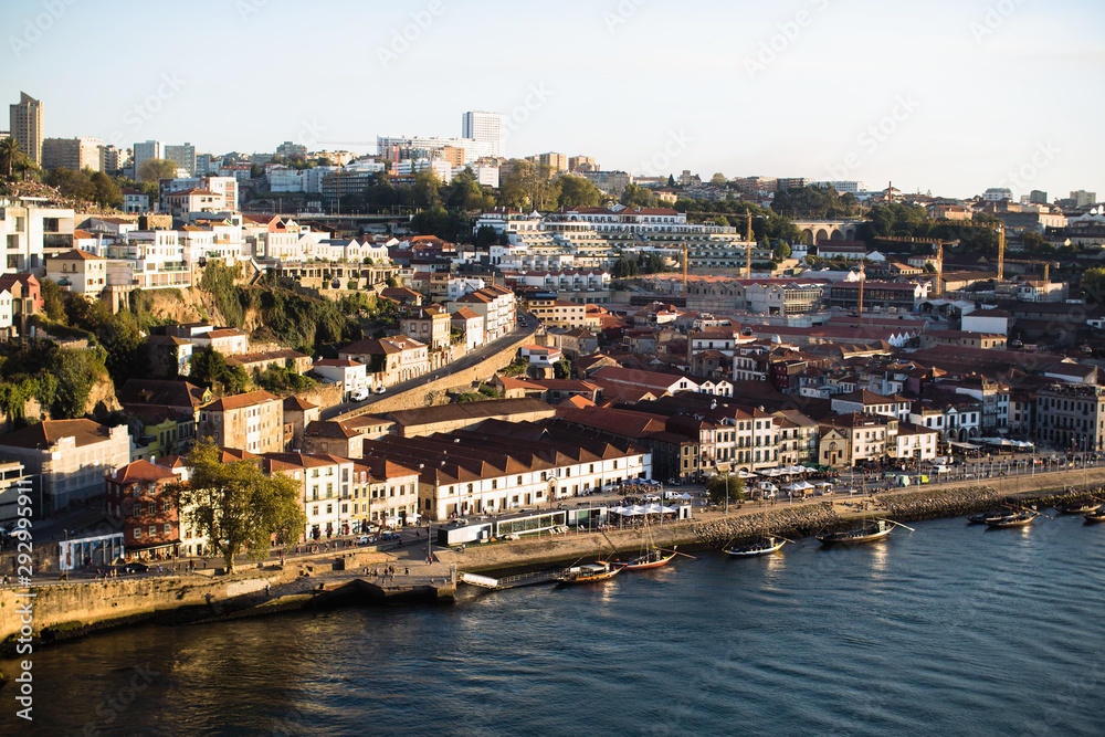 Fototapeta premium View of Douro river and the promenade of Vila Nova de Gaia in the historic center of Porto, Portugal.