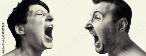 Man and woman yell at each other on white isolated background.