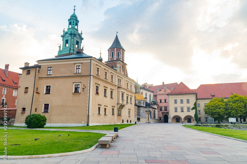 Morning view of Wawel Royal Castle complex with Wawel Cathedral or The Royal Archcathedral Basilica of Saints Stanislaus and Wenceslaus in the morning.