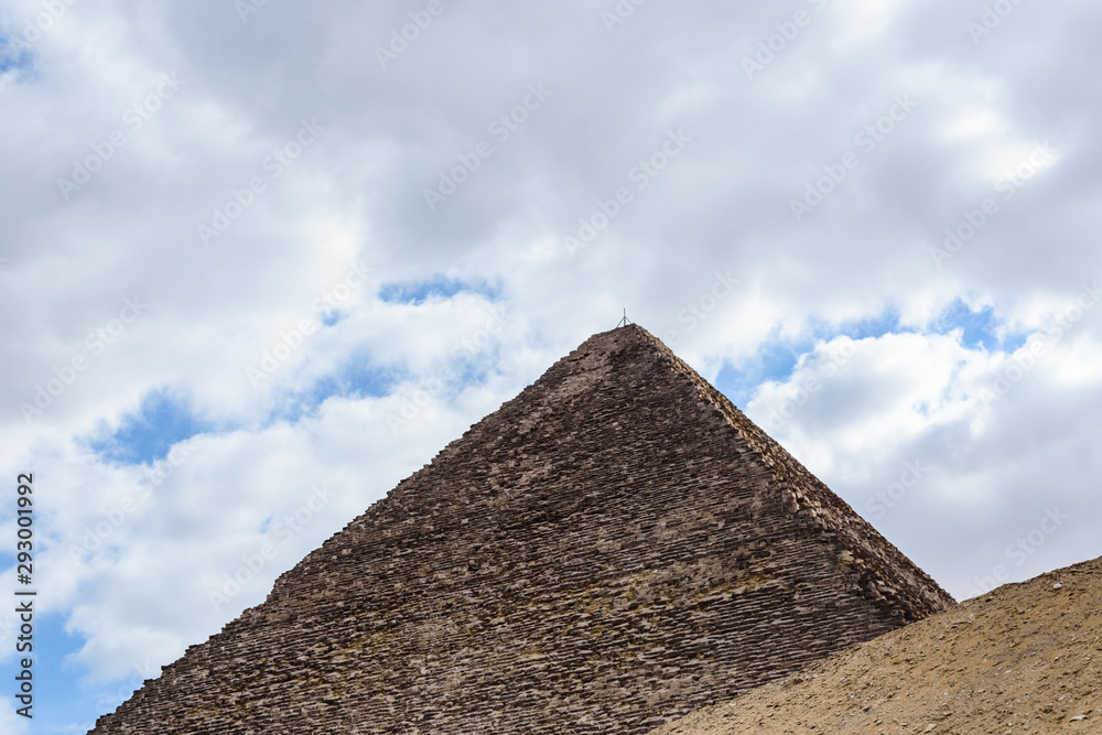 The great pyramid of Cheops in Giza plateau. Cairo, Egypt The great pyramid of Cheops in Giza plateau. Cairo, Egypt
