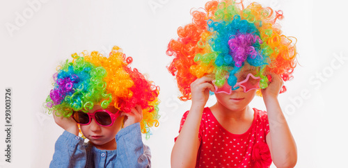 Studio portraits of beautiful caucasian child girls superstars in glasses. Concept about lifestyle and beauty.