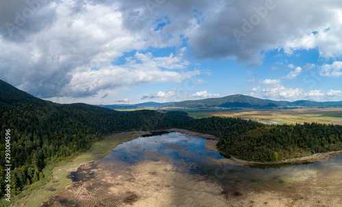 Lake Cerknica (Slovene: Cerknisko Jezero, Cerkniško jezero ) is an intermittent lake on Cerknica Polje ( Cerknisko Polje ) an biggest karst phenomena in Slovenia.