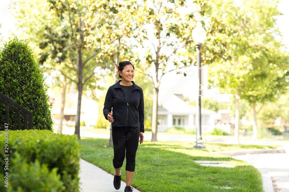 Portrait of a fit Asian woman exercising.
