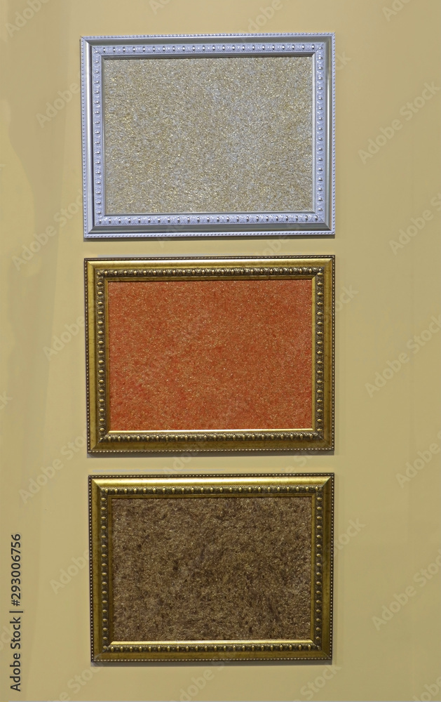Fototapeta premium Picture frames on yellow wall
