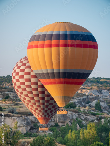 hot air balloon tours rising over cappadocia