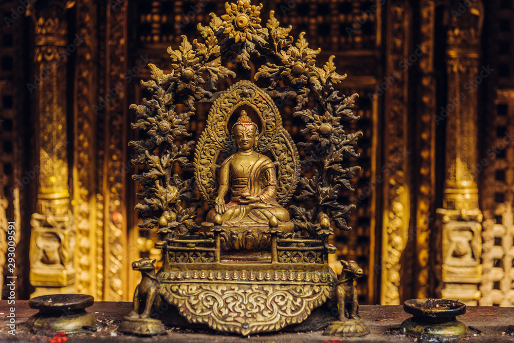 Obraz premium The golden temple in Patan, unique Buddhist monastery in north of Durbar Square, Kathmandu of Nepal.