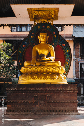 The golden temple in Patan, unique Buddhist monastery in north of Durbar Square, Kathmandu of Nepal. photo