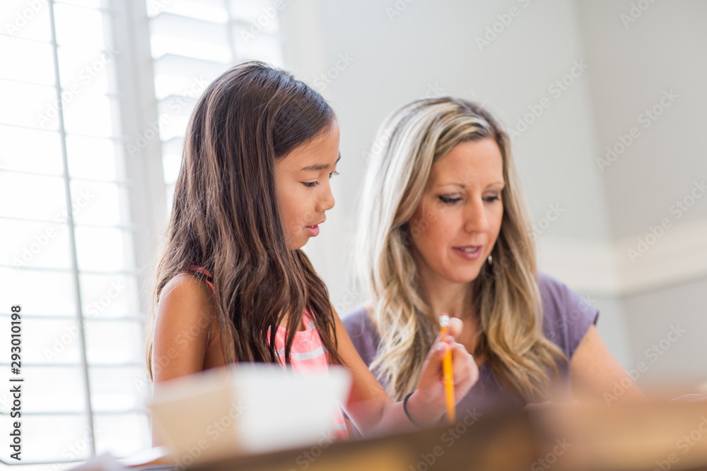 Teacher Helping Her Student With Her Homework Teacher Helping Her Student With Her Homework