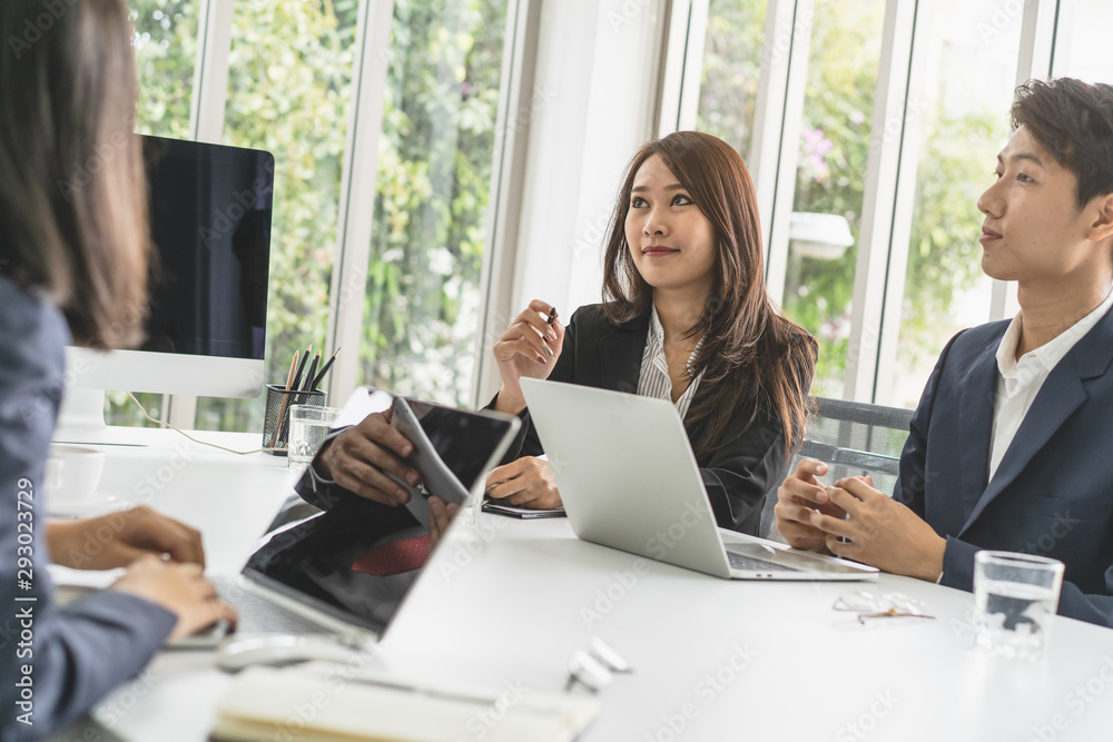 Group of employees meeting and discussing in conference room to share ideas. Group of employees meeting and discussing in conference room to share ideas.