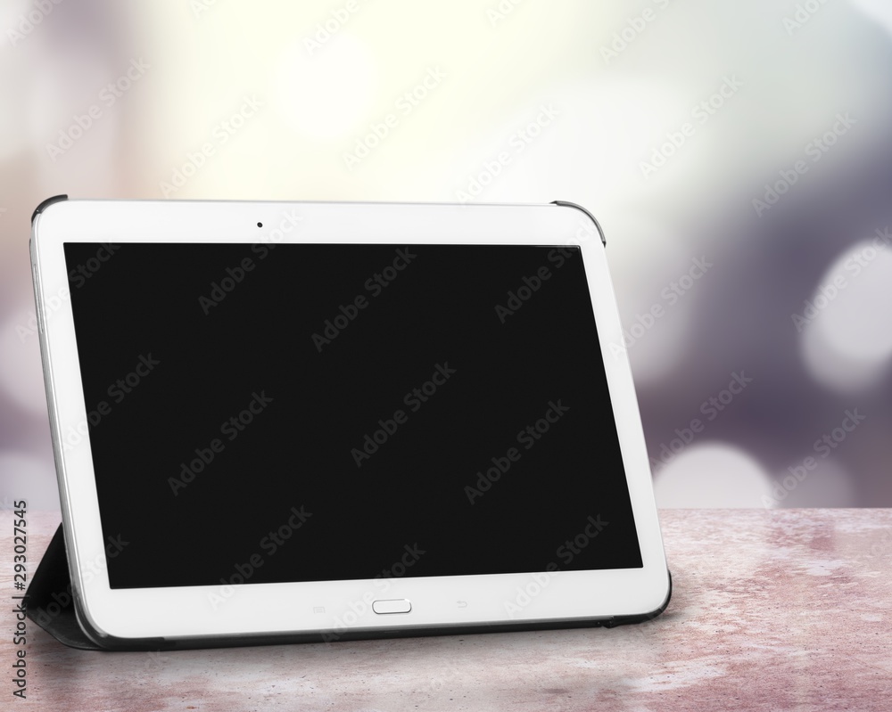 Modern digital tablet on wooden background Modern digital tablet on wooden background