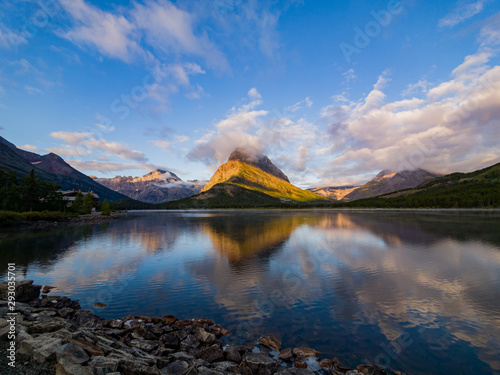 Fototapeta Naklejka Na Ścianę i Meble -  Sunrise of the Mount Wilbur, Swiftcurrent Lake in the Many Glacier area of the famous Glacier National Park