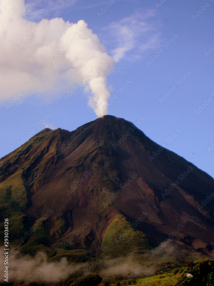 Arenal volcano in Costa Rica with a cloud plume