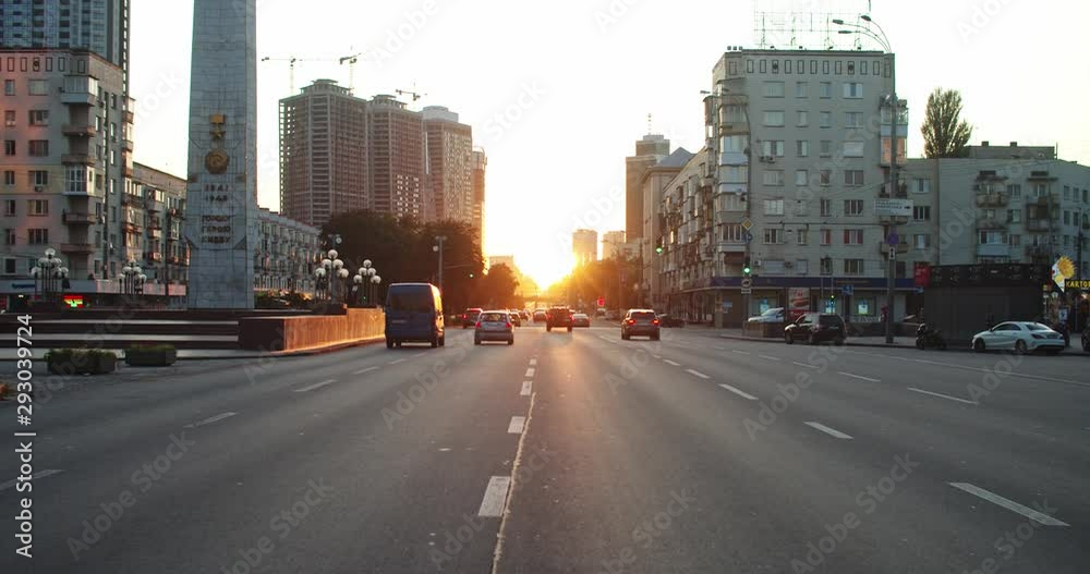 Drive in beautiful modern city under sunset sky. Roadtrip along famous street attraction Victory square in Kiev, Ukraine. Drive in beautiful modern city under sunset sky. Roadtrip along famous street attraction Victory square in Kiev, Ukraine.