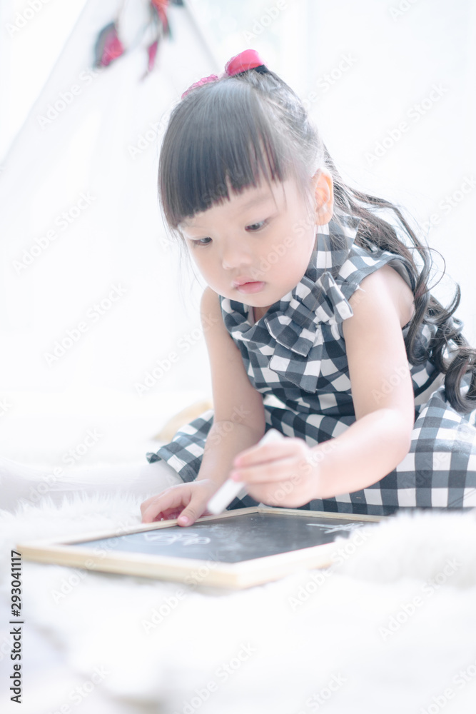 Merry christmas happy little child with beautifully decorated christmas tree holidays in home, christmas concept Merry christmas happy little child with beautifully decorated christmas tree holidays in home, christmas concept