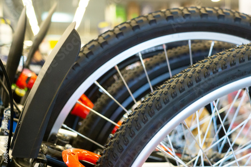 Variety of new bikes in line in bike shop