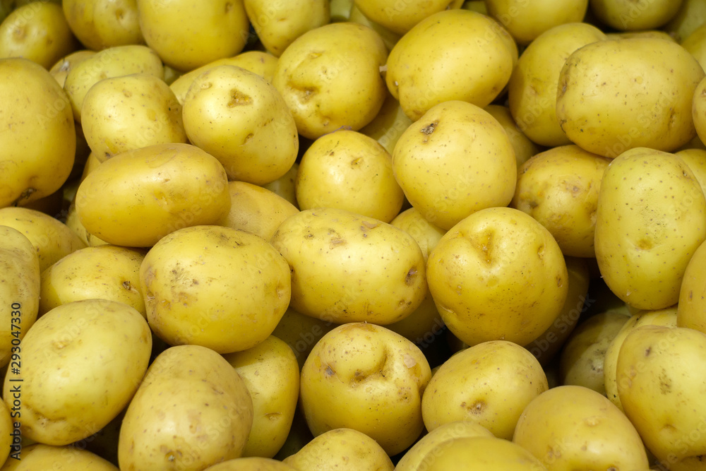 potato yellow background texture selling vegetables potato yellow background texture selling vegetables