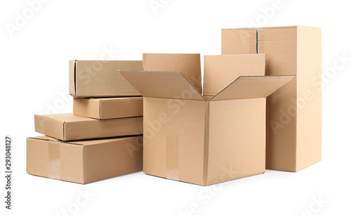 Pile of cardboard boxes on white background © New Africa