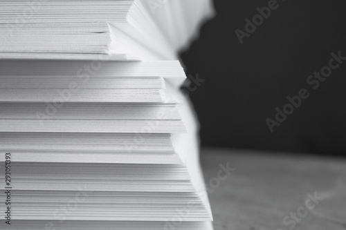 Stack of blank white paper on table, closeup. Space for text