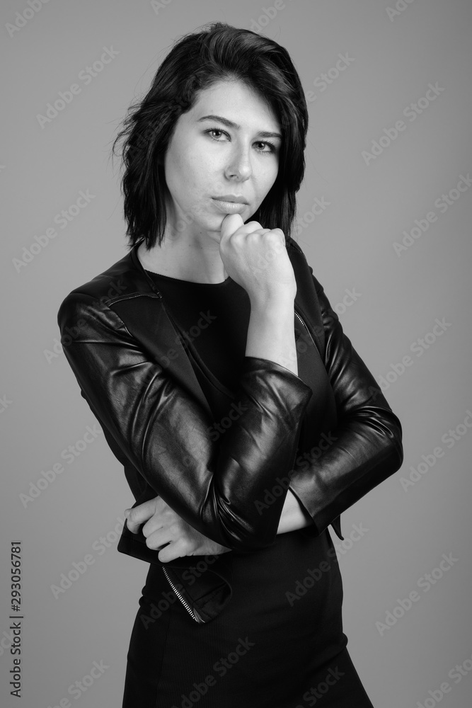 Fototapeta premium Portrait of young beautiful woman shot in black and white