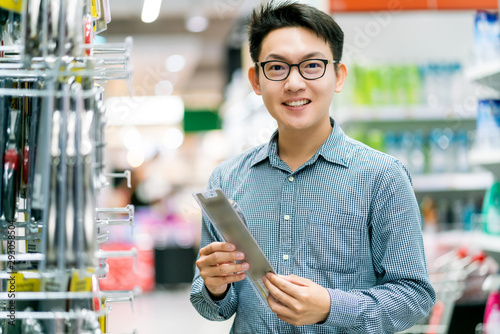 Fotografie asian customer smart male wear shirt happiness shopping in department store busi