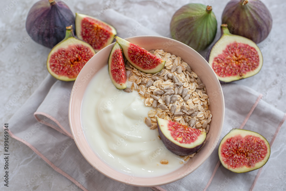 healthy yogurt with fresh figs on a table healthy yogurt with fresh figs on a table