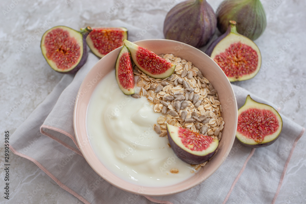 healthy yogurt with fresh figs on a table healthy yogurt with fresh figs on a table