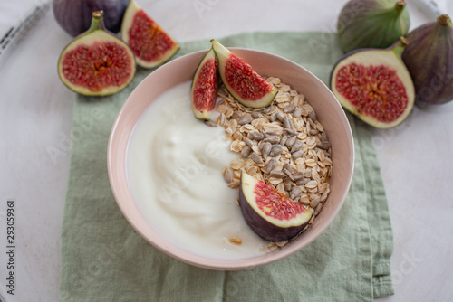 healthy yogurt with fresh figs on a table
