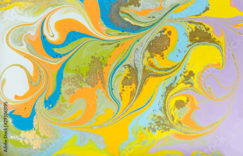 Colorful pastel marble pattern with golden glitter. Abstract liquid background