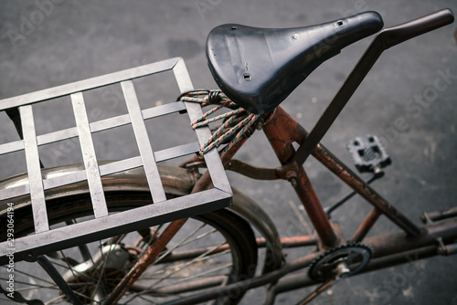detail of classic vintage saddle of saleng or tricycle or three-wheel bicycle, shallow depth of field