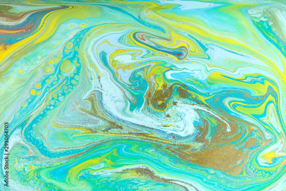 Blue and yellow marble pattern with golden glitter. Abstract liquid background Blue and yellow marble pattern with golden glitter. Abstract liquid background