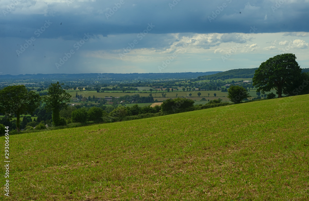 Obraz premium View from the hill on tranquil landscape in rural Normandy