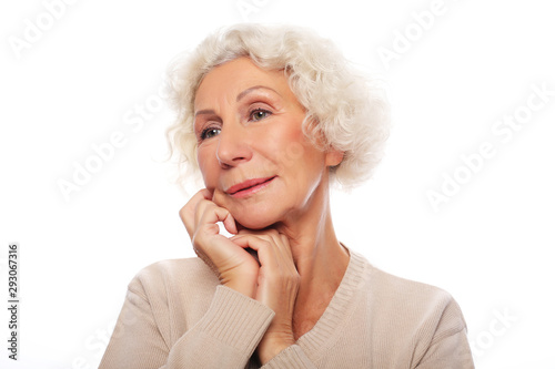lifestyle, emotion and people concept: Grey haired old nice beautiful laughing woman. Isolated over vwhite background
