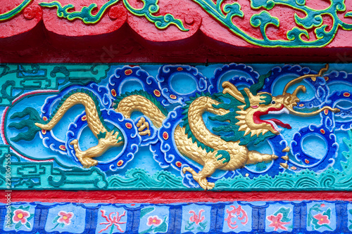 Dragon colorful bas-relief in a taoist temple in QingChengShan, Sichuan province, China
