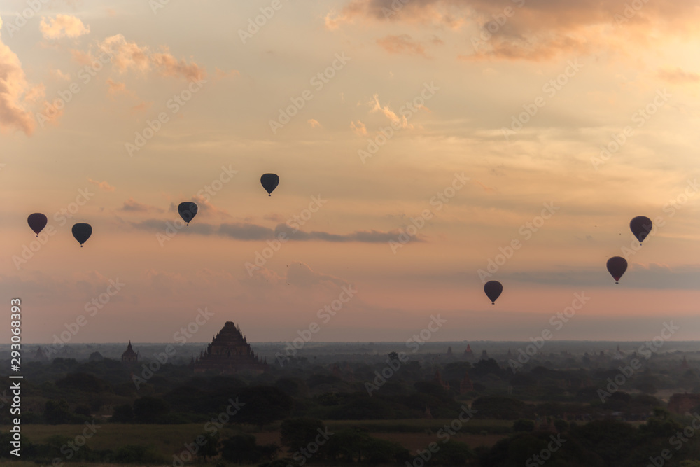 Dawn over the ancient Pagan city, Myanmar. The view from the top of Shwesandaw Temple.  View of Dhammayangyi Temple.