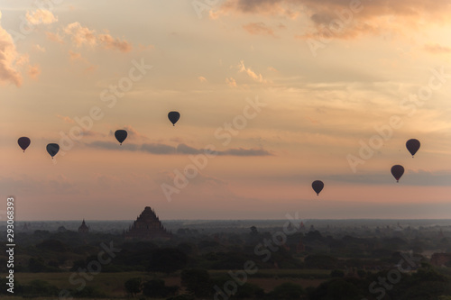 Dawn over the ancient Pagan city, Myanmar. The view from the top of Shwesandaw Temple. View of Dhammayangyi Temple.