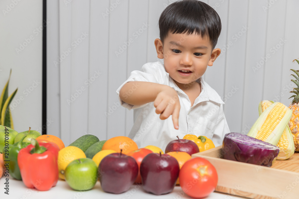 Healthy and nutrition concept. Kid learning about nutrition with doctor to choose eating fresh fruits and vegetables. Healthy and nutrition concept. Kid learning about nutrition with doctor to choose eating fresh fruits and vegetables.