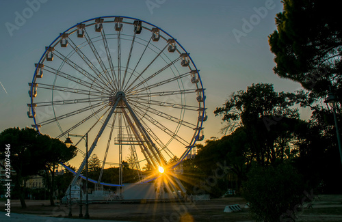 Wallpaper Mural Sunset image of the Ferris wheel in Olbia, Sardinia Torontodigital.ca