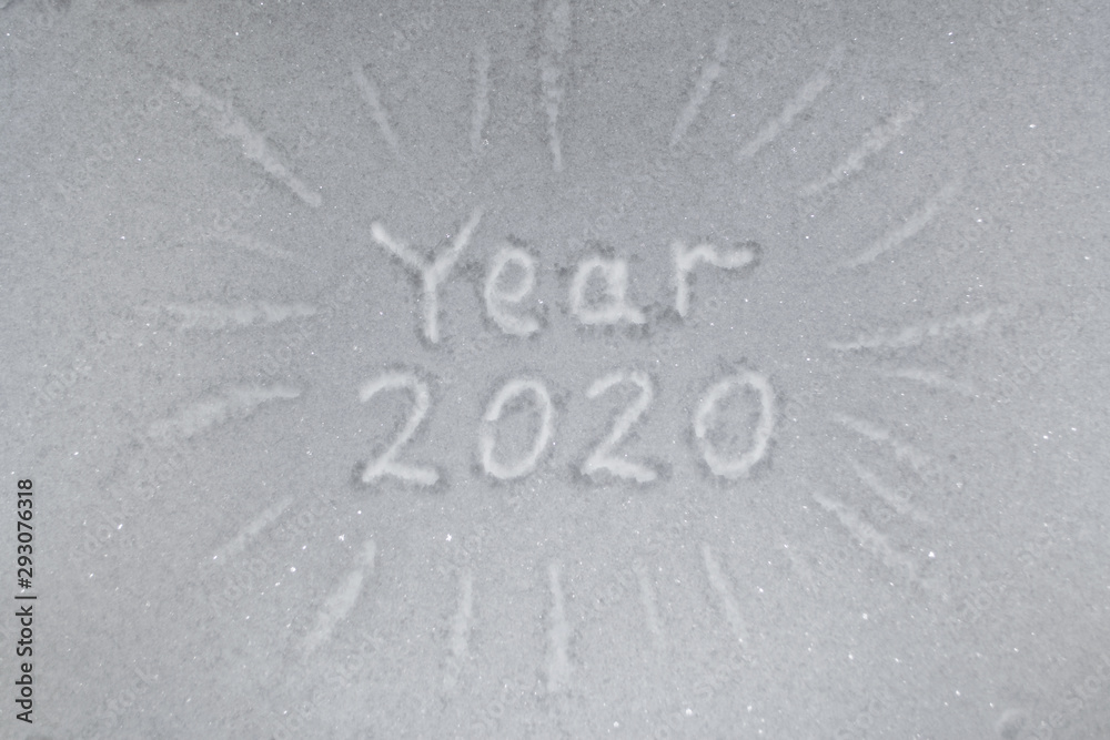 Fototapeta premium inscription text 2020 year in the snow