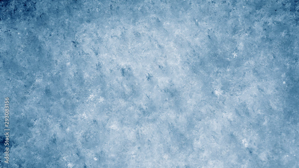 Real snow glowing texture. Christmas and New Year holidays shiny background