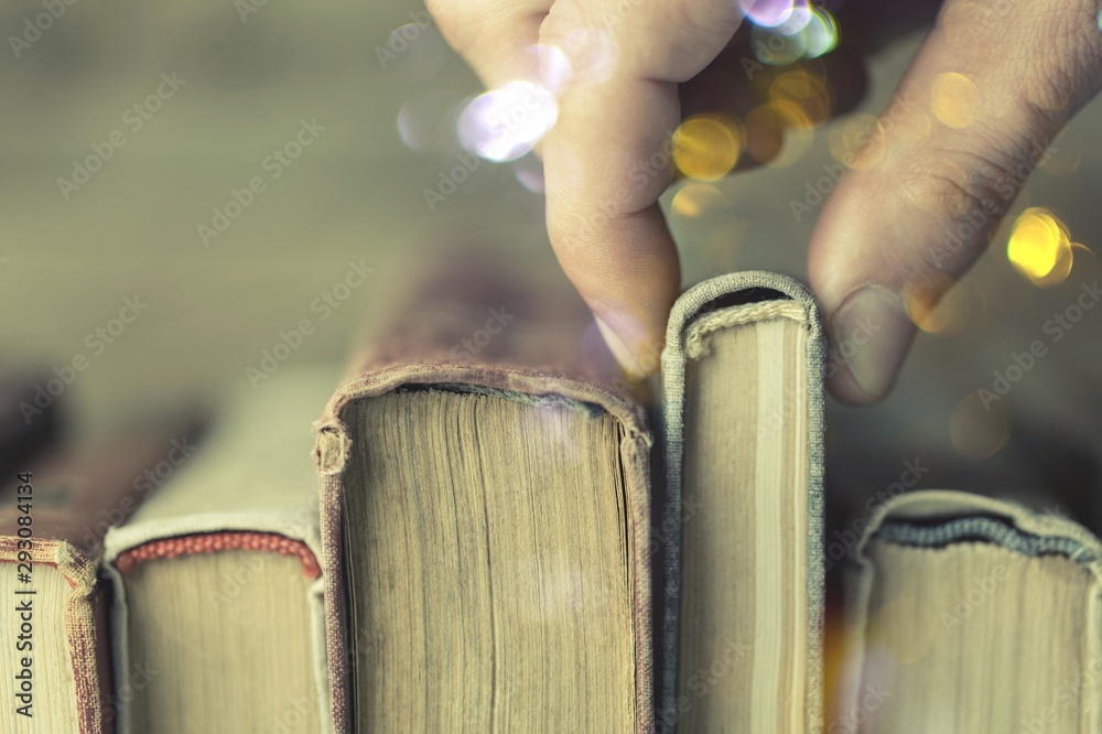 Obraz premium Image of a hand selecting a old