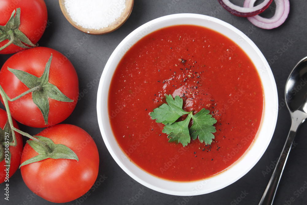 A plate with gazpacho - traditional Spanish tomato soup A plate with gazpacho - traditional Spanish tomato soup