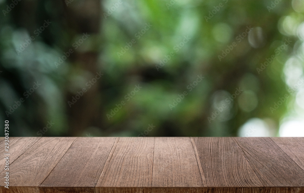 Empty dark wooden table in front of abstract blurred bokeh background of restaurant . can be used for display or montage your products.Mock up for space. Empty dark wooden table in front of abstract blurred bokeh background of restaurant . can be used for display or montage your products.Mock up for space.