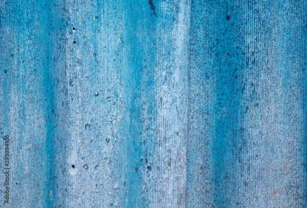 The wall is painted with blue paint as an abstract background The wall is painted with blue paint as an abstract background