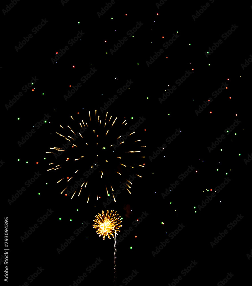 Fireworks sparkles in the night sky as background Fireworks sparkles in the night sky as background