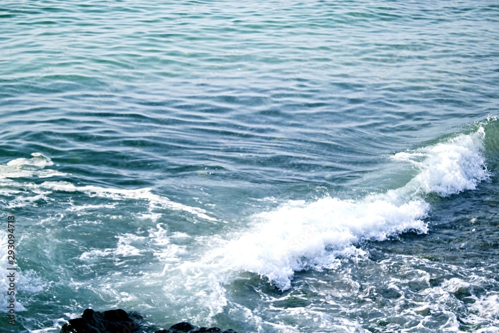 Water surface with small waves moving in the direction of the wind. movement of water surface ripples and waves. sea eater background 