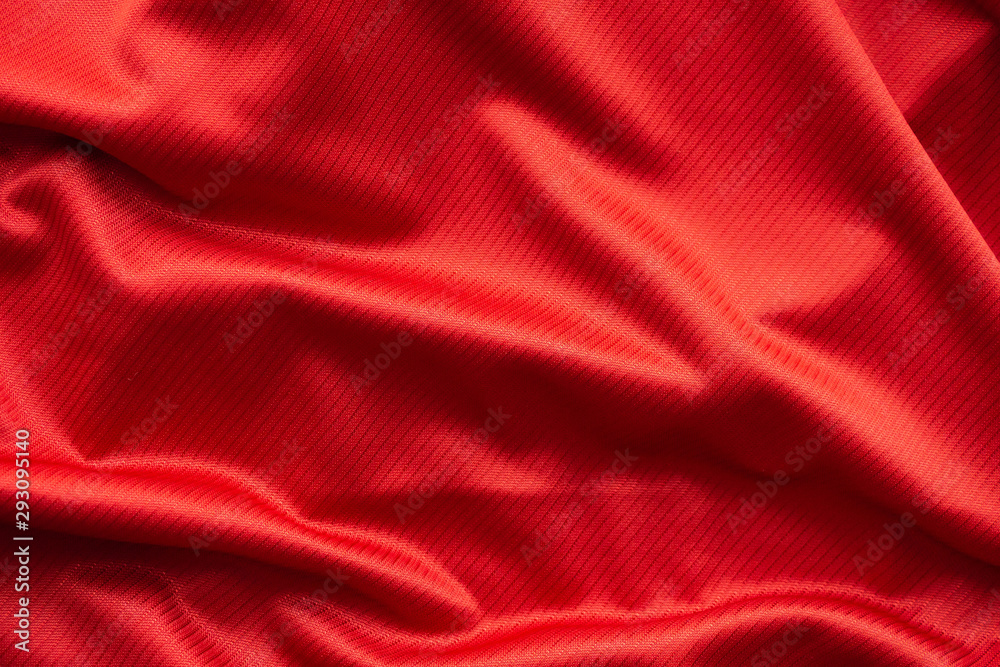 Red sports clothing fabric football jersey texture close up Red sports clothing fabric football jersey texture close up