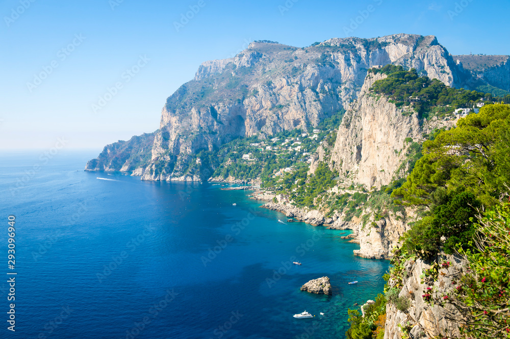 Bright scenic morning view of the dramatic cliff landscape of the Mediterranean island of Capri, Italy