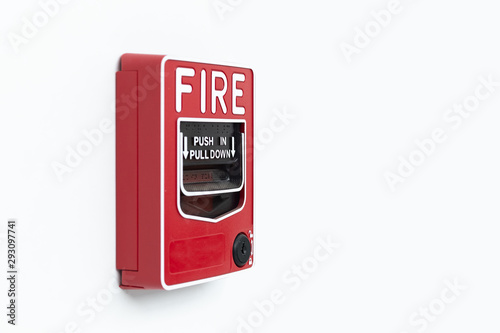 Red fire alarm box on white wall Inside building, Alarm device.