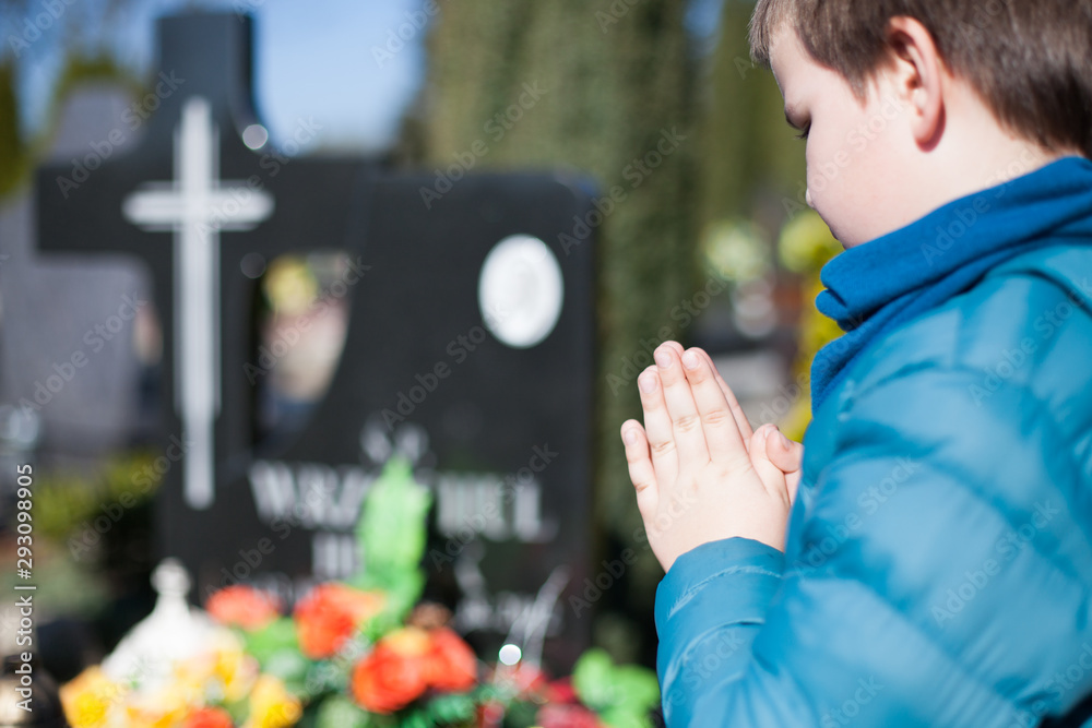 All Souls' Day - cemetery, memory of the dead, prayer and candles
